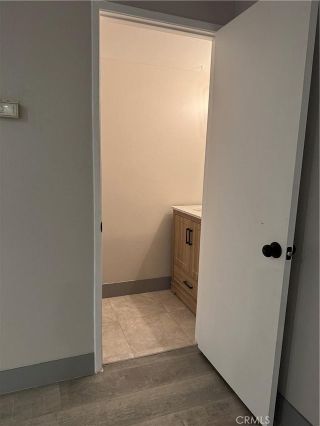 7445 Laurelgrove Ave Unit 2, North Hollywood, CA 91605 - bathroom with vanity and wood finished floors