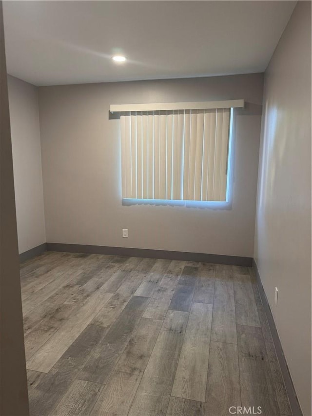 7445 Laurelgrove Ave Unit 2, North Hollywood, CA 91605 - spare room with wood finished floors, recessed lighting, and plenty of natural light