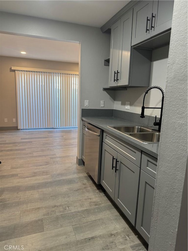 7445 Laurelgrove Ave Unit 2, North Hollywood, CA 91605 - kitchen with dishwasher, gray cabinetry, light wood-style flooring, dark countertops, and recessed lighting