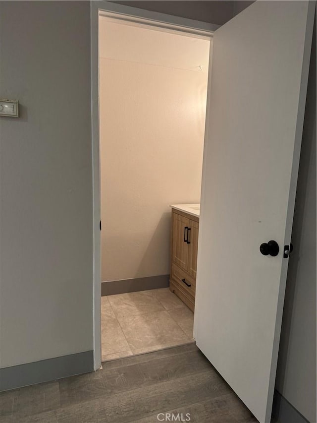 7445 Laurelgrove Ave Unit 2, North Hollywood, CA 91605 - bathroom featuring vanity and wood finished floors