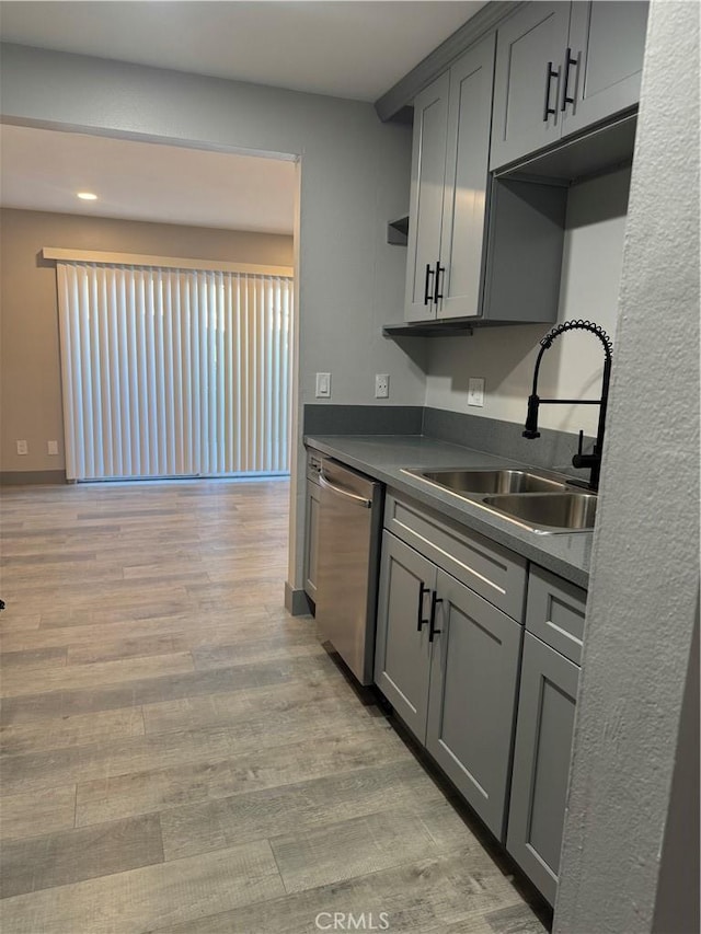 7445 Laurelgrove Ave Unit 2, North Hollywood, CA 91605 - kitchen featuring dishwasher, gray cabinetry, light wood-type flooring, dark countertops, and recessed lighting