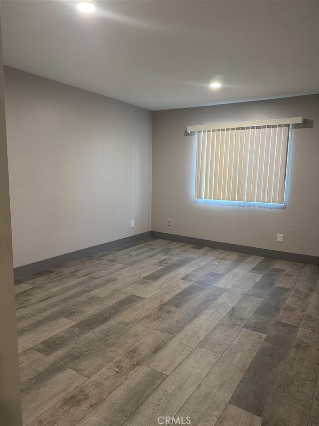 7445 Laurelgrove Ave Unit 2, North Hollywood, CA 91605 - unfurnished room with dark wood-style flooring and recessed lighting