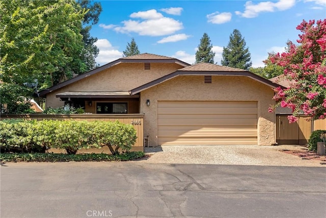 2665 Waverly Ct, Chico, CA 95973 - view of front facade featuring concrete driveway, stucco siding, and an attached garage