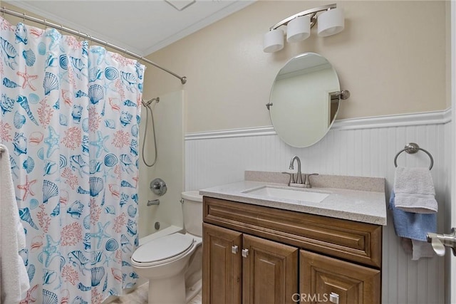 2665 Waverly Ct, Chico, CA 95973 - bathroom featuring vanity, a wainscoted wall, shower / bathtub combination with curtain, and crown molding