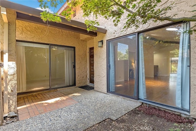 2665 Waverly Ct, Chico, CA 95973 - property entrance with stucco siding and a patio