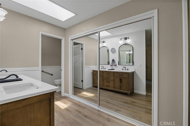 2665 Waverly Ct, Chico, CA 95973 - full bath with double vanity and wood finished floors