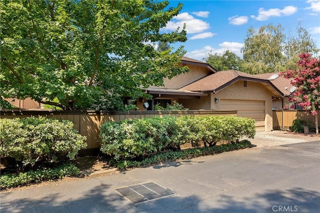 2665 Waverly Ct, Chico, CA 95973 - view of front facade featuring an attached garage and stucco siding