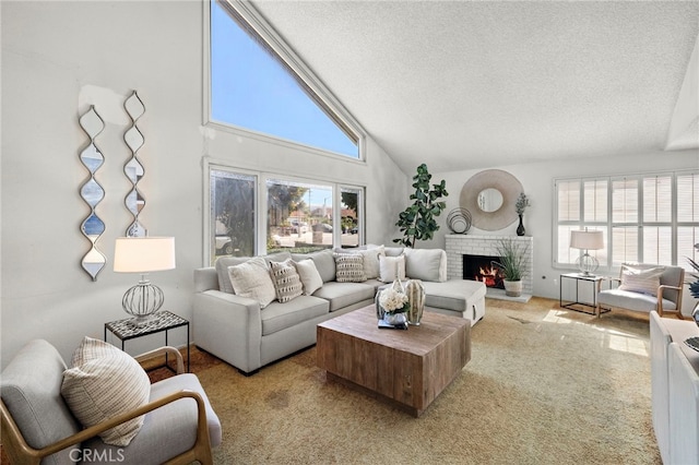 11551 Gladstone Cir, Fountain Valley, CA 92708 - living area with a textured ceiling, light colored carpet, a brick fireplace, healthy amount of natural light, and high vaulted ceiling