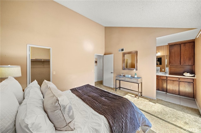 11551 Gladstone Cir, Fountain Valley, CA 92708 - bedroom with light carpet and high vaulted ceiling