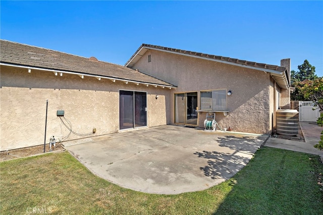 11551 Gladstone Cir, Fountain Valley, CA 92708 - back of property with stucco siding and a patio area