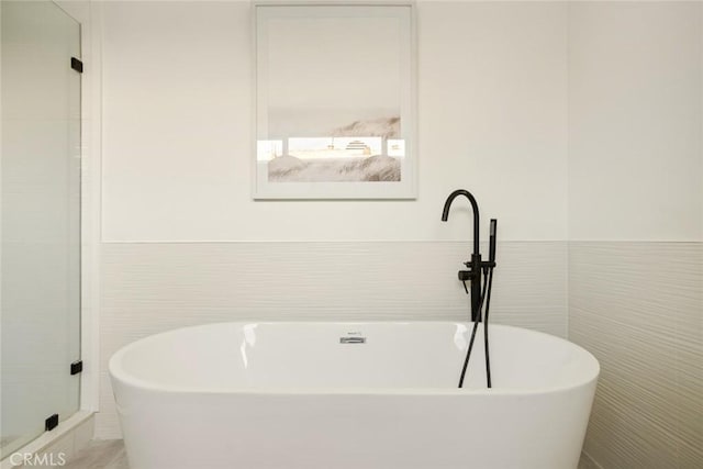 1585 Miramar Dr, Newport Beach, CA 92661 - full bathroom with a freestanding bath, tile walls, and a shower with shower door