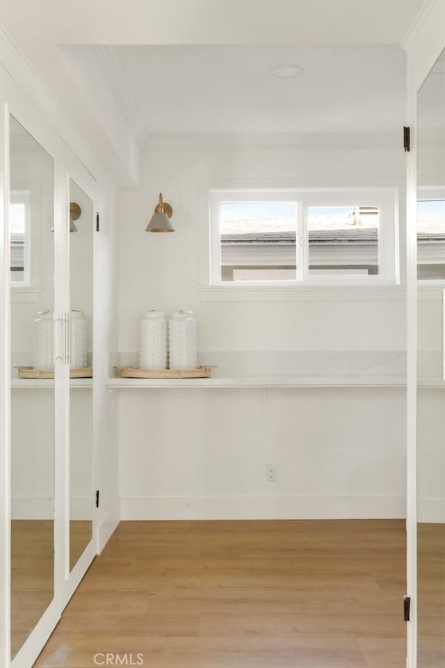 1585 Miramar Dr, Newport Beach, CA 92661 - spare room with crown molding and light wood finished floors