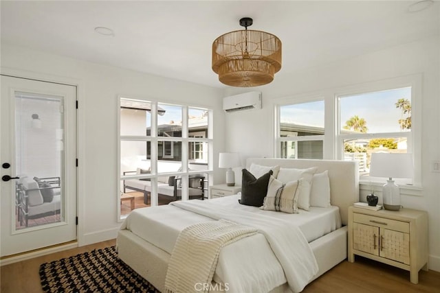 1585 Miramar Dr, Newport Beach, CA 92661 - bedroom with a wall unit AC and wood finished floors