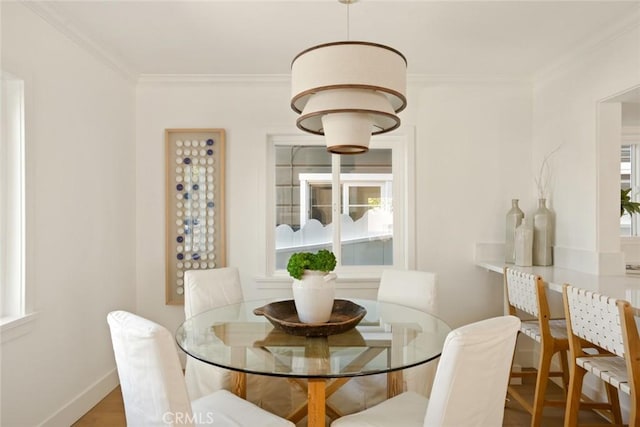 1585 Miramar Dr, Newport Beach, CA 92661 - dining area featuring ornamental molding and wood finished floors