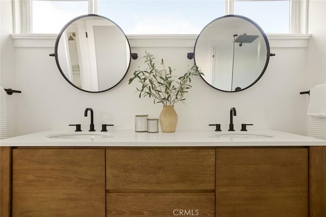1585 Miramar Dr, Newport Beach, CA 92661 - full bathroom with double vanity and healthy amount of natural light