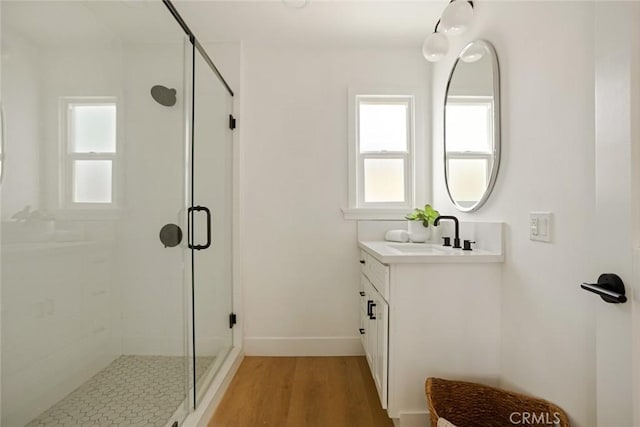1585 Miramar Dr, Newport Beach, CA 92661 - full bathroom with a stall shower, vanity, plenty of natural light, and wood finished floors
