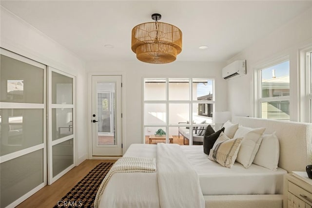 1585 Miramar Dr, Newport Beach, CA 92661 - bedroom with a wall mounted air conditioner and wood finished floors