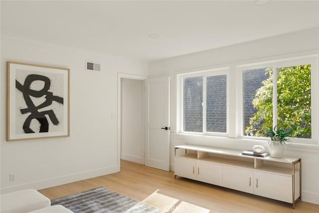 1585 Miramar Dr, Newport Beach, CA 92661 - living area featuring light wood-type flooring and baseboards