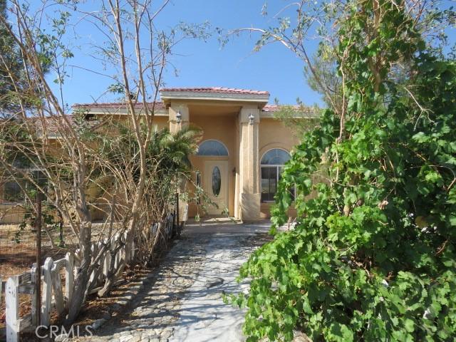 2425 Tokay Rd, Phelan, CA 92371 - view of front of property with stucco siding