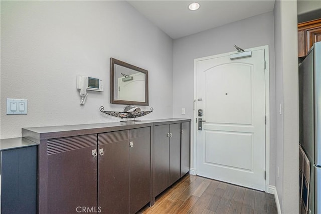 1026 S Oxford Ave Unit 206, Los Angeles, CA 90006 - entryway featuring dark wood-style floors and recessed lighting