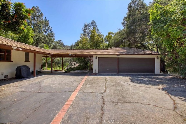 1075 Pine Oak Ln, Pasadena, CA 91105 - garage with asphalt driveway