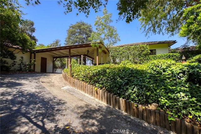 1075 Pine Oak Ln, Pasadena, CA 91105 - view of front of home with stucco siding and asphalt driveway