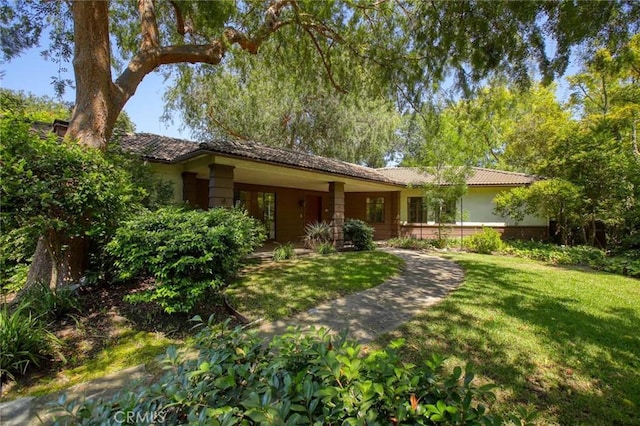1075 Pine Oak Ln, Pasadena, CA 91105 - ranch-style house featuring a tile roof, a front lawn, and stucco siding