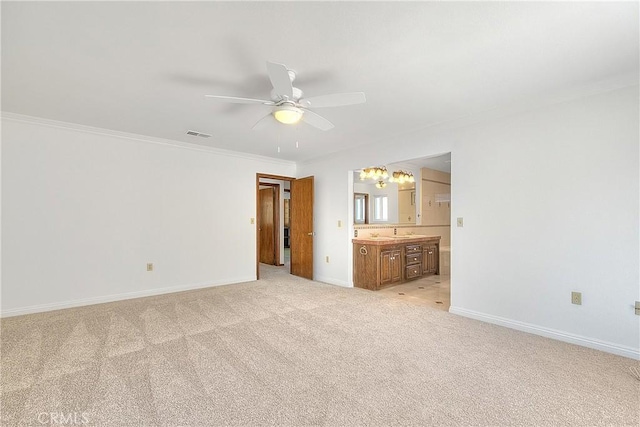 2290 Decade Ct, Riverside, CA 92506 - unfurnished bedroom featuring a chandelier, ornamental molding, light carpet, connected bathroom, and ceiling fan