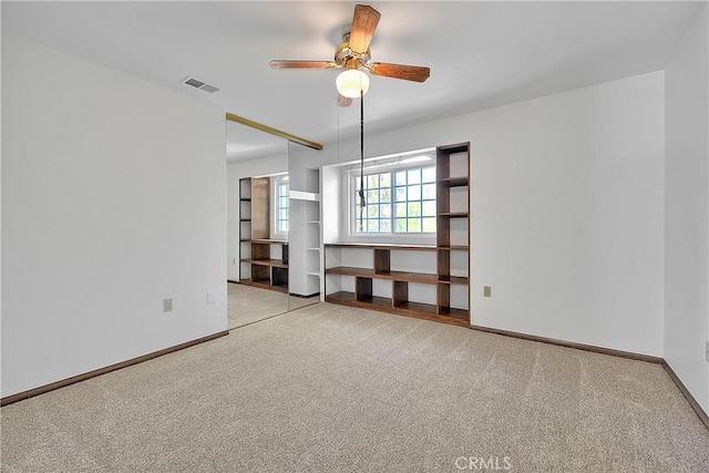 2290 Decade Ct, Riverside, CA 92506 - empty room with carpet floors and a ceiling fan