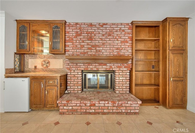 2290 Decade Ct, Riverside, CA 92506 - unfurnished living room featuring a fireplace and light tile patterned floors