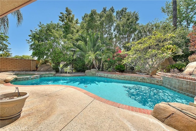 2290 Decade Ct, Riverside, CA 92506 - view of pool with a patio area, a fenced backyard, and a pool with connected hot tub