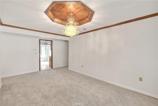 2290 Decade Ct, Riverside, CA 92506 - spare room with a chandelier, light carpet, a raised ceiling, and ornamental molding