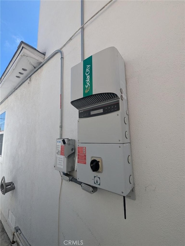 891 W Elberon Ave, San Pedro, CA 90731 - exterior view of related energy utilities and stucco siding
