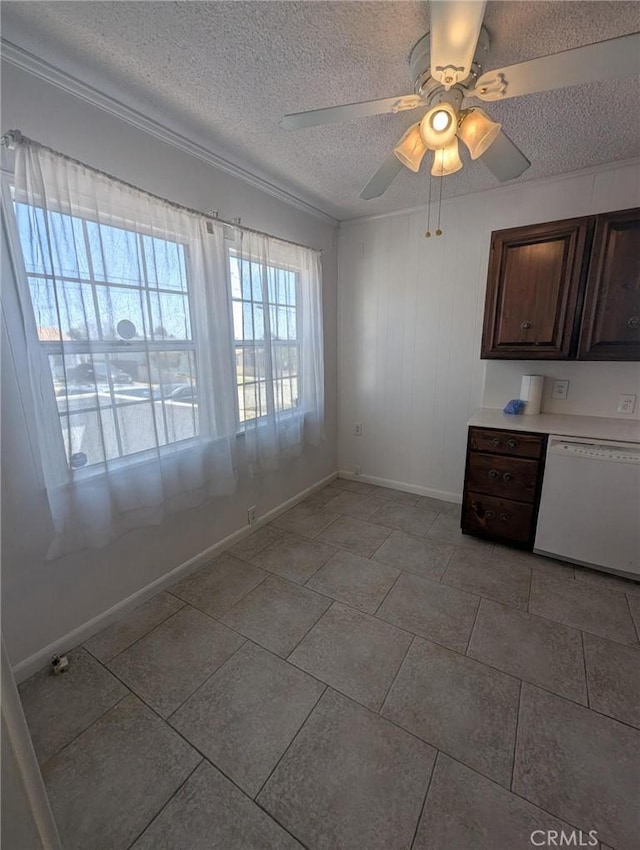 891 W Elberon Ave, San Pedro, CA 90731 - unfurnished dining area with a textured ceiling, a ceiling fan, and crown molding