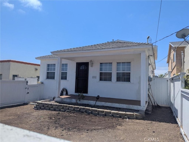 891 W Elberon Ave, San Pedro, CA 90731 - view of front facade with a fenced backyard and stucco siding