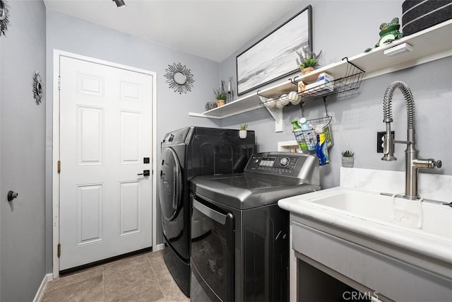 185 Alabaster Loop, Perris, CA 92570 - laundry area featuring independent washer and dryer and baseboards