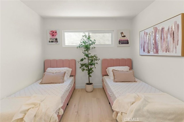 17698 Locust St, Fountain Valley, CA 92708 - bedroom featuring light wood finished floors