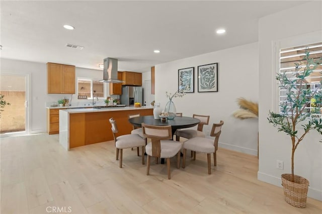 17698 Locust St, Fountain Valley, CA 92708 - dining room with plenty of natural light, light wood-style floors, and recessed lighting