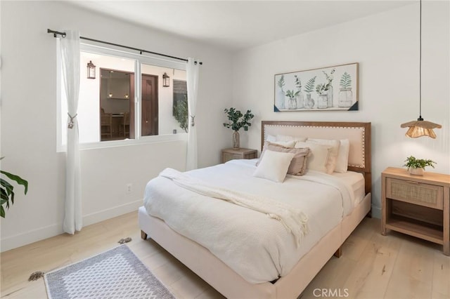17698 Locust St, Fountain Valley, CA 92708 - bedroom with wood finished floors and baseboards