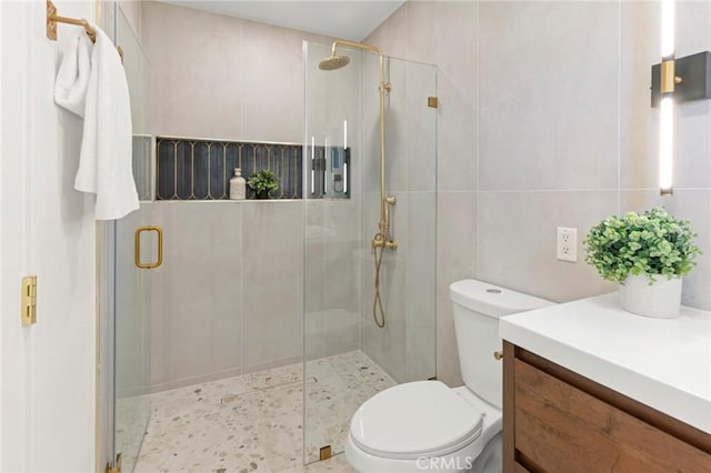 17698 Locust St, Fountain Valley, CA 92708 - full bathroom with a shower stall, tile walls, and vanity