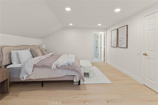 17698 Locust St, Fountain Valley, CA 92708 - bedroom featuring recessed lighting, wood finished floors, lofted ceiling, and connected bathroom