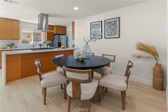 17698 Locust St, Fountain Valley, CA 92708 - dining space featuring recessed lighting and light wood-style floors