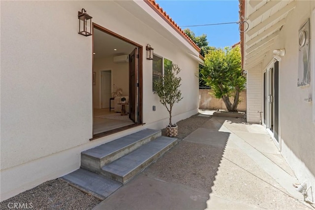 17698 Locust St, Fountain Valley, CA 92708 - view of patio featuring a wall mounted AC