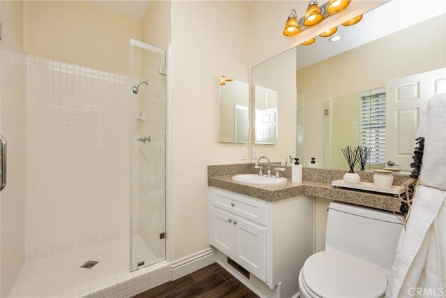 2 Via Barcaza, Coto De Caza, CA 92679 - bathroom featuring wood finished floors, a tile shower, and vanity