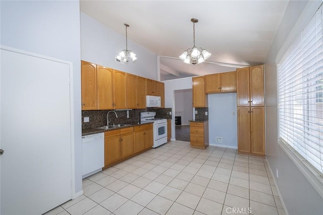 24691 Tarazona, Mission Viejo, CA 92692 - kitchen featuring white appliances, a chandelier, vaulted ceiling, tasteful backsplash, and hanging light fixtures