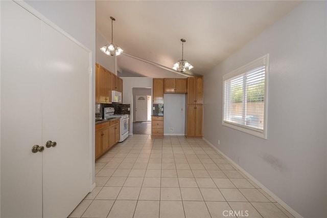 24691 Tarazona, Mission Viejo, CA 92692 - kitchen featuring white appliances, a chandelier, tasteful backsplash, vaulted ceiling, and pendant lighting