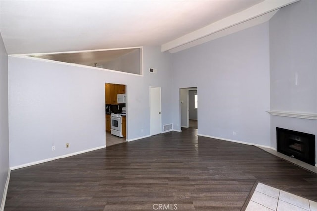 24691 Tarazona, Mission Viejo, CA 92692 - unfurnished living room featuring a fireplace, wood finished floors, and high vaulted ceiling