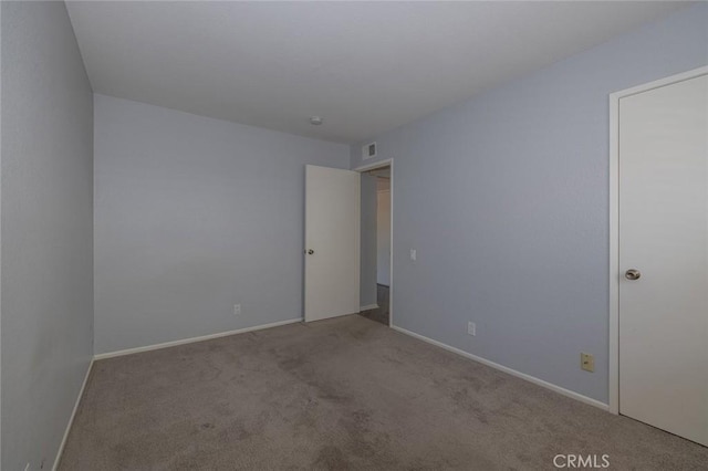 24691 Tarazona, Mission Viejo, CA 92692 - spare room featuring carpet floors and baseboards