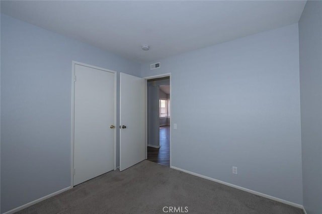 24691 Tarazona, Mission Viejo, CA 92692 - unfurnished bedroom featuring carpet flooring and a closet