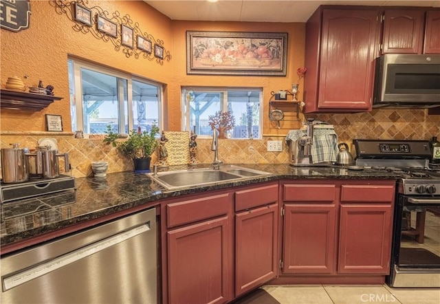 24000 Wheatfield Cir, Wildomar, CA 92595 - kitchen with stainless steel appliances, decorative backsplash, and plenty of natural light